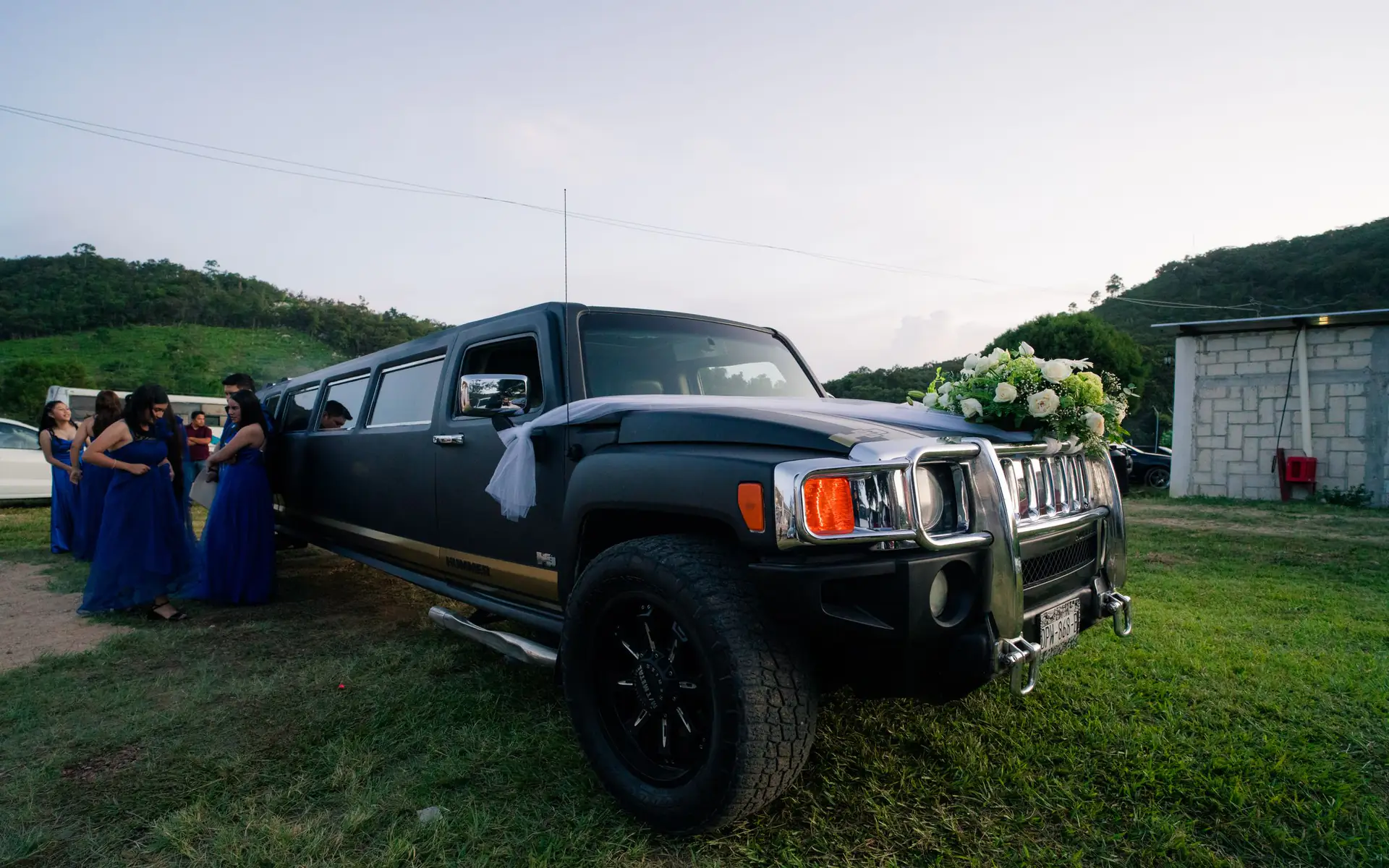 Black Hummer stretch limousine decorated for a wedding
