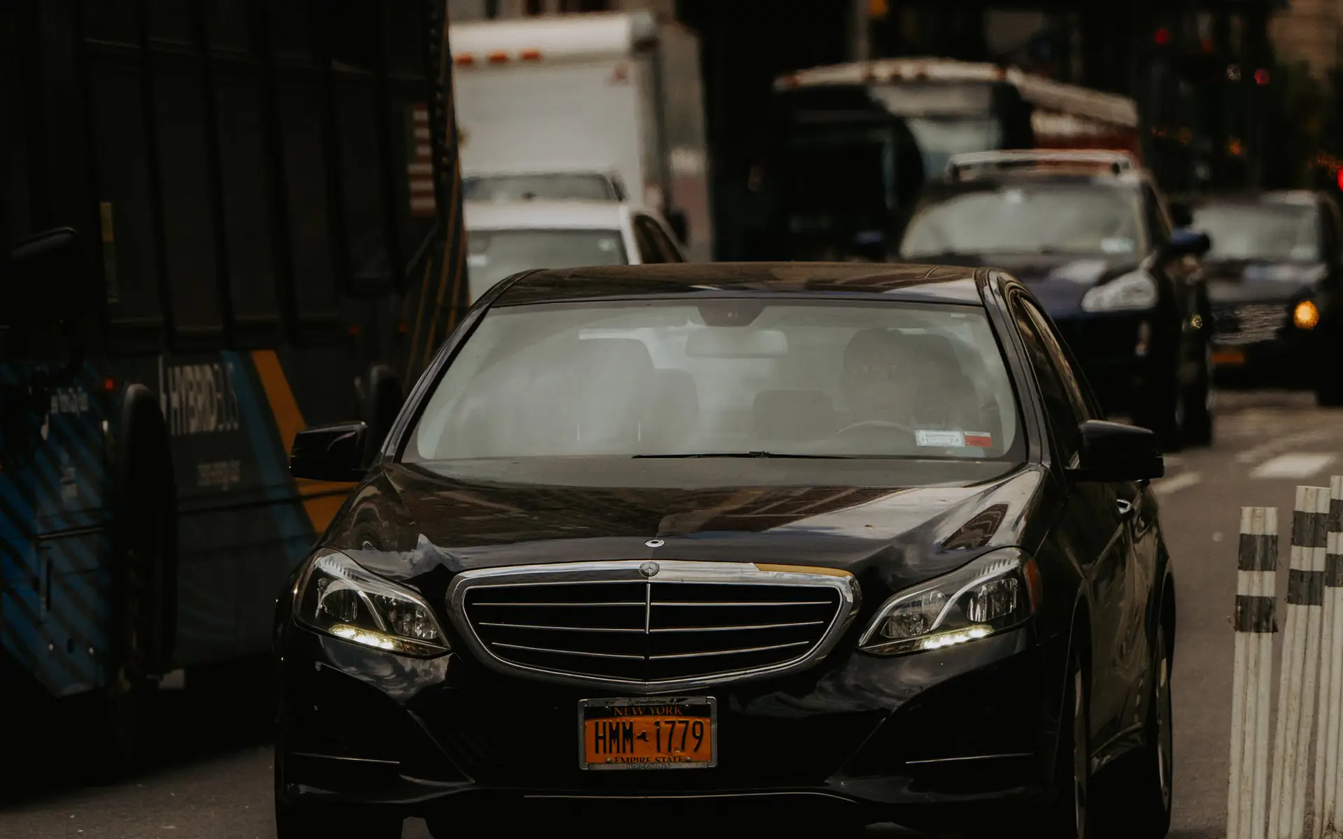 Black Mercedes-Benz E-Class luxury sedan for airport limo service