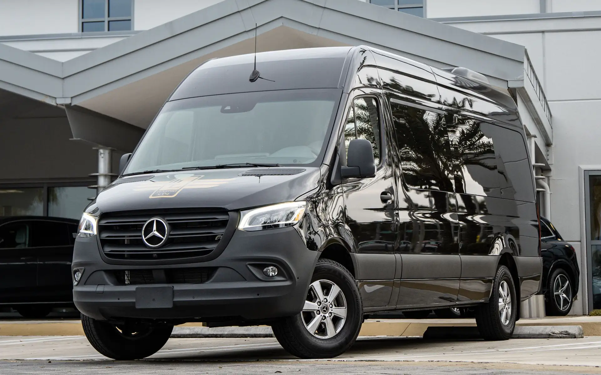 Black Mercedes-Benz Sprinter van for group travel