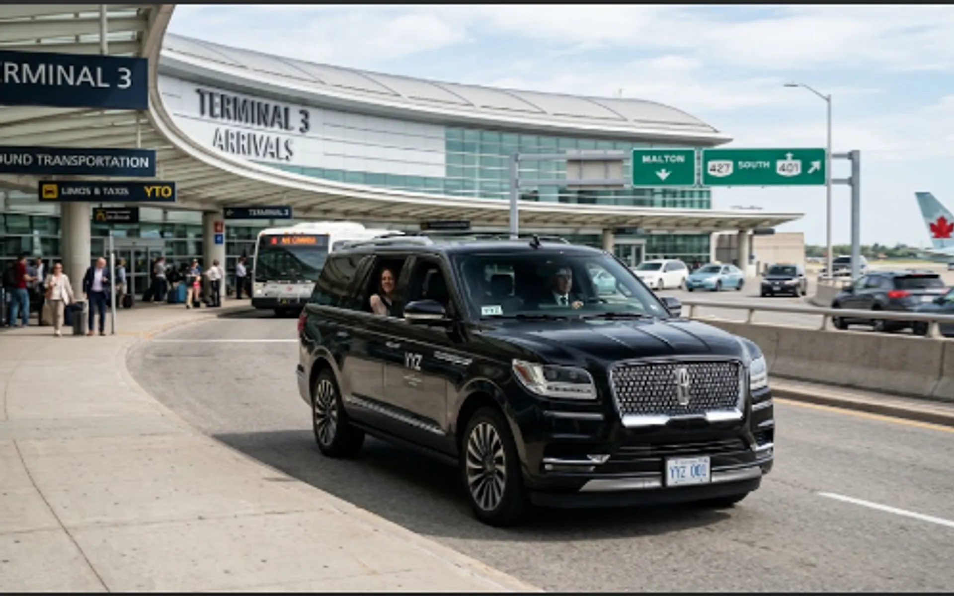 Black Lincoln Navigator airport limo picking up passengers at Toronto Pearson Terminal 3 Arrivals
